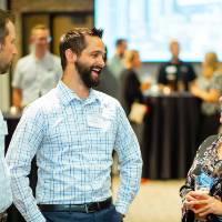 Seymour Padnos with guests at the Engineering Design Project Preview Event